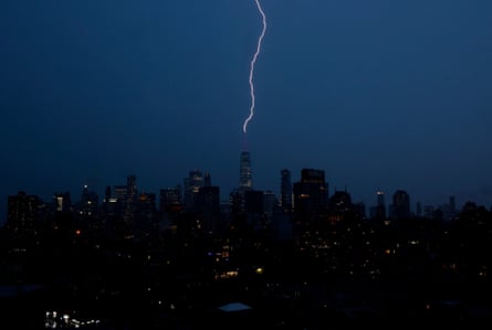 a bolt of lightning strikes a building