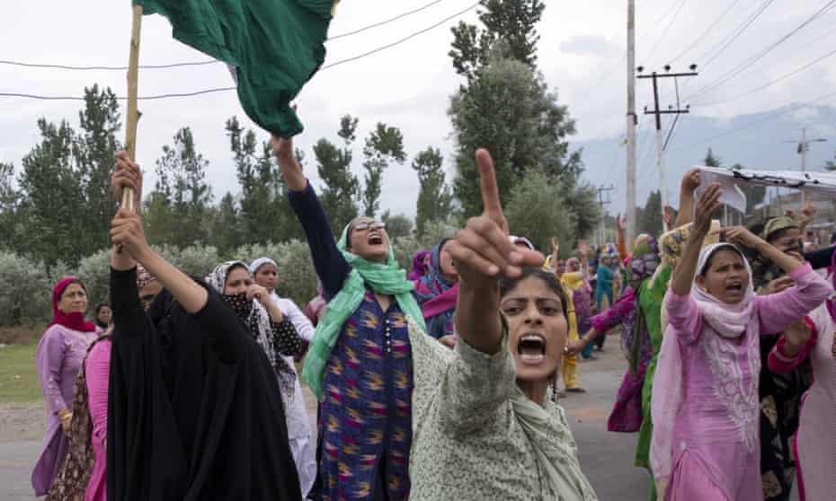 Female Muslim protesters in Srinagar faced police firing teargas and rubber pellets on Friday. 