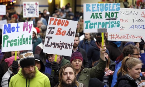 People rally to protest Donald Trump’s travel ban on refugees and citizens of seven Muslim-majority nations.