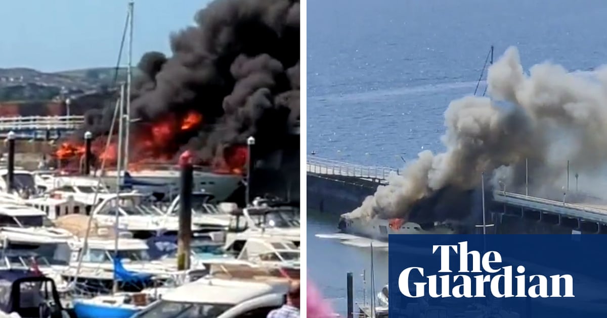 Superyacht worth £6m goes up in flames in Torquay – video