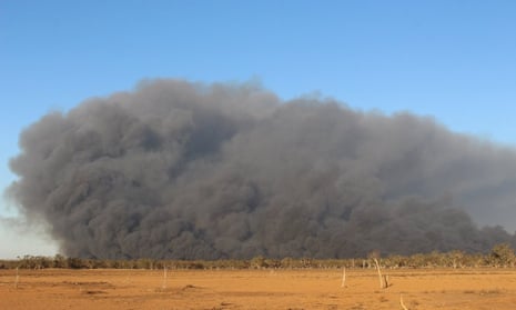 Smoke rises from a bushfire at Macquarie Marshes in central north-west New South Wales.