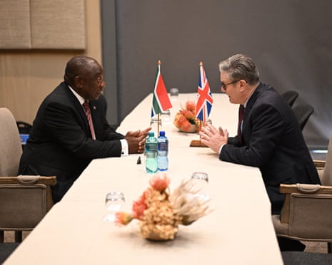 Prime minister Keir Starmer (R) speaks with South Africa’s president Cyril Ramaphosa (L) during a bilateral meeting in Johannesburg before the G20 leaders’ summit.