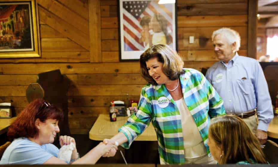 Karen Handel greets diners during a campaign stop at Old Hickory House in Tucker, Georgia Monday.