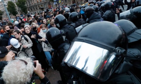 Russian police clash with demonstrators in St Petersburg, Russia, 21 September.