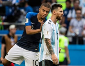 Kylian Mbappé of France comforts Argentina’s Lionel Messi at the end of a match that finished 4-3 to France.