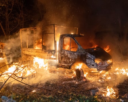 A vehicle burns after the Russian attack in Kharkiv