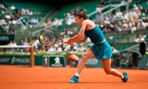 Simona Halep returns the ball to Alison Riske.