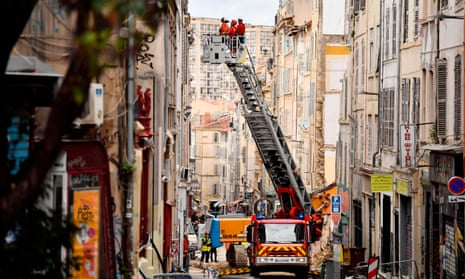Rescue services inspect the neighbouring buildings of those that collapsed in Marseille in November 2018.