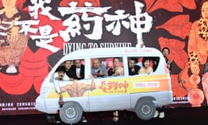   Director Wen Muye with actors and the Dying To Survive team 