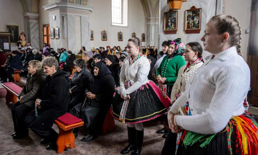 Women in traditional folk dress at Christmas mass last week