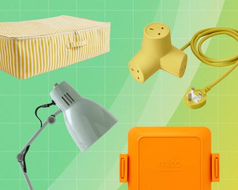 A striped storage bag, yellow extension cord, grey desk lamp, and orange lunchbox on a green background