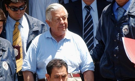 Manuel Contreras leaves police headquarters in Santiago, Chile, in 2005.