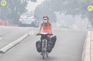 People wear face masks to protect from the pollution.