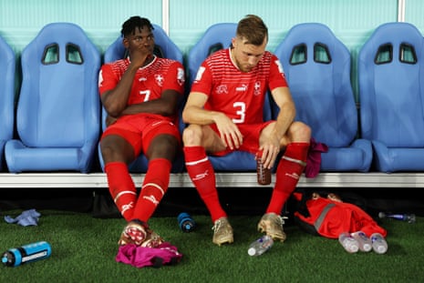 Breel Embolo and Silvan Widmer of Switzerland show dejection after their 0-1 defeat to Brazil.