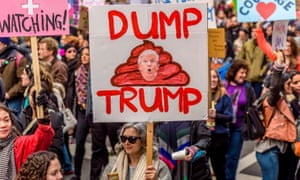 Protester carrying an anti-Trump sign at a Women’s March in New York.