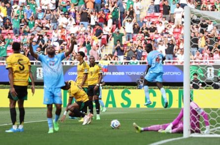 Axel Tuanzebe celebrates after scoring a goal in extra time that sends the Democratic Republic of Congo into the World Cup finals.
