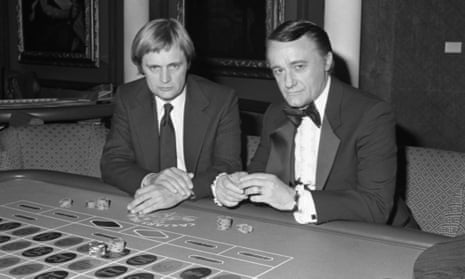 A black and white photo of a young David McCallum