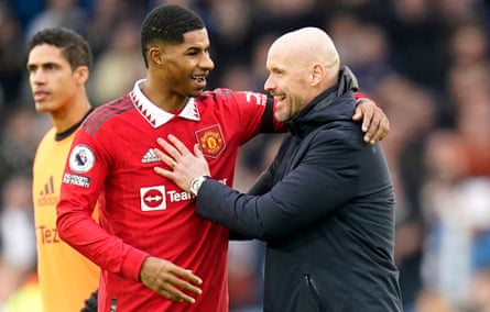 The Manchester United manager Erik ten Hag (right) celebrates victory against Leeds with Marcus Rashford at Elland Road.
