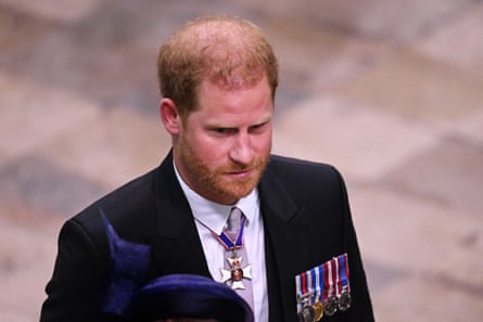 Prince Harry departs Westminster Abbey during the Coronation of King Charles