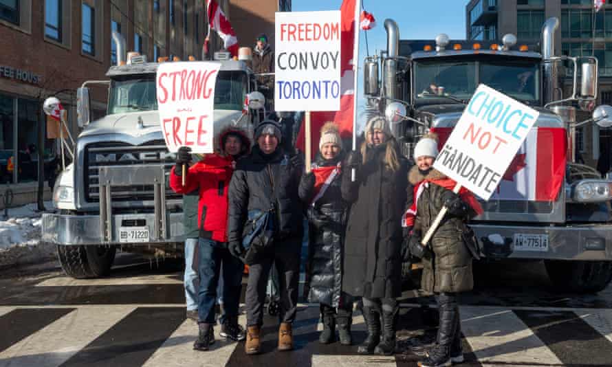Demonstrators gather for a protest against Covid-19 vaccine mandates and restrictions in downtown Toronto on 5 February.