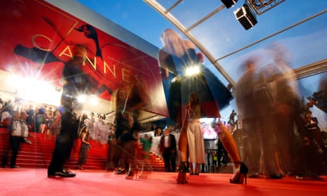 Guests arriving at a Cannes film festival premiere.