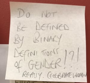 Members of the public have stuck Post-it notes around the notice giving their reaction.