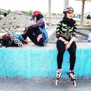 Women getting ready to roller skate at Azadi Sports Complex, Tehran, Iran.