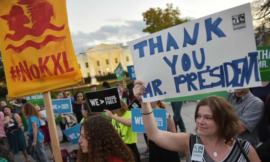 Activists in front of the White House celebrate President Obama’s blocking of the Keystone XL oil pipeline on Friday.