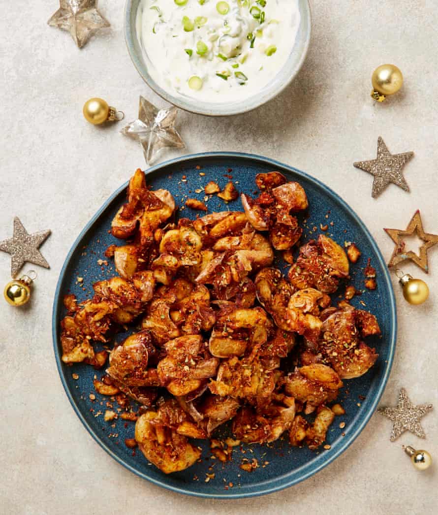 Yotam Ottolenghi’s crispy smashed new potatoes with spiced salt and spring onion creme fraiche.