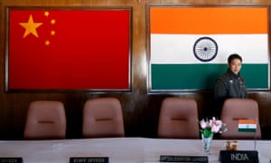 The flags of China and India are displayed at a conference room used for meetings between military commanders on the Indo-China border.