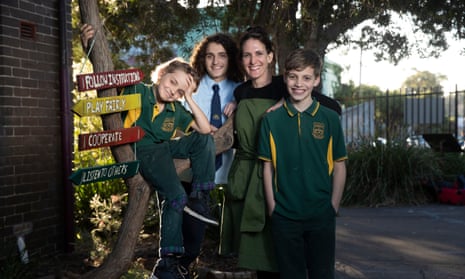 Proudly public: Lisa Barbagallo with her sons,15,11 and 8, at a public school in the inner west of Sydney.