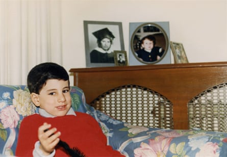 a child sits on a couch