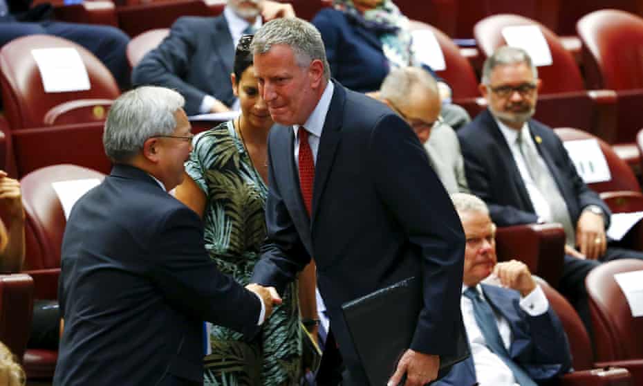 Mayor Bill de Blasio of New York City is greeted by San Francisco mayor Ed Lee during the Modern Slavery and Climate Change meeting at the Vatican on Tuesday.