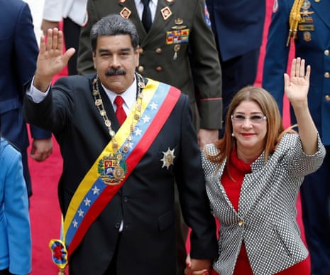 Nicolas Maduro and Cilia Flores wave as they arrive at the national assembly in Caracas, Venezuela, on 24 May 2018.
