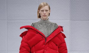A model off-shoulders on the Balenciaga catwalk.