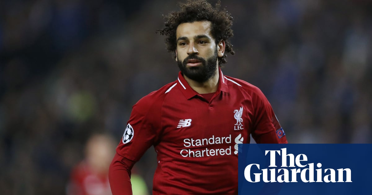 Boy meets Mo Salah after lamppost collision while chasing his hero