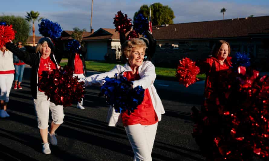 Members of the Sun City Poms cheerleading group practise marching and dancing in unison