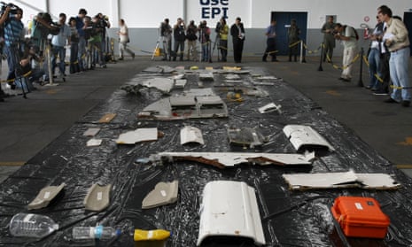 Journalists looking at pieces of the wreckage of Flight 447 in 2009.