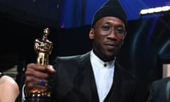 Mahershala Ali holds his best supporting actor award for his role in Green Book