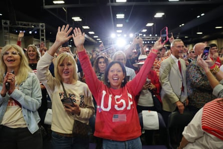 a woman with her hands up