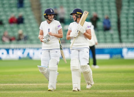 England’s Nat Sciver and Alice Davidson-Richards leave the field at the end of day two.