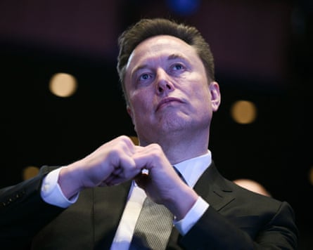 Elon Musk looks on as US President Donald Trump speaks at the US-Saudi Investment Forum at the John F. Kennedy Center for the Performing Arts in Washington, DC on November 19, 2025