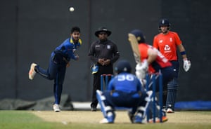 Kamindu Mendis bowls right arm over to Eoin Morgan.