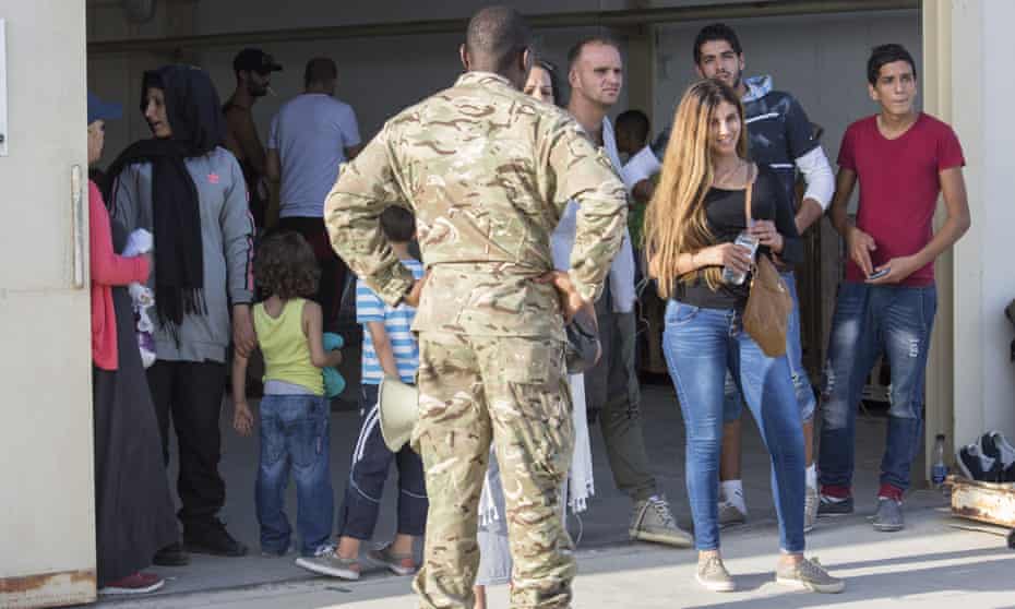 The arrivals were temporarily housed at a warehouse at RAF Akrotiri in Cyprus. 