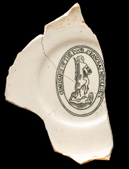 A broken plate depicting an image of St Pancras surrounded by the words 'Protector of the Poor St Pancras Middlesex'