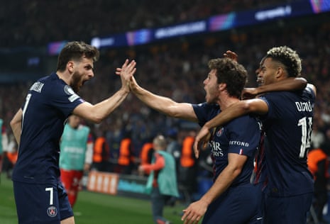 Paris St Germain’s Joao Neves (second right) celebrates scoring their second goal with fellow goalscorer Khvicha Kvaratskhelia (left) and Desire Doue.