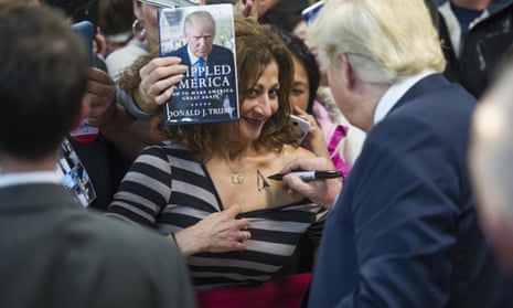 Donald Trump autographs woman's chest on the campaign trail