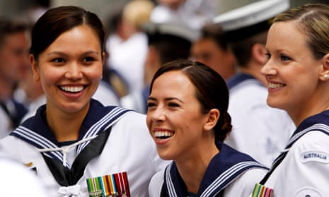 Royal Australian navy personnel share a joke.