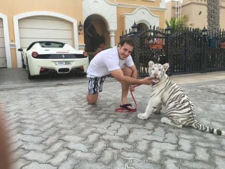 For feature about Britains imprisoned in Dubai. Wolfgang Douglas with Snowy the tiger, a gift from a ruling family member.