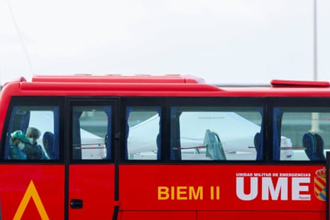 Passengers from the MV Hondius sit aboard a bus at the port of Granadilla de Abona in Tenerife.